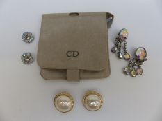 A pair of Christian Dior earrings and two pairs of paste earrings