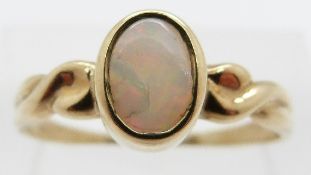 A 9ct gold ring set with an opal, size Q/R, 1.7g.