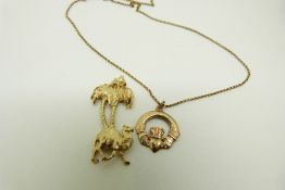 A 9ct gold chain, 9ct gold pendant and 9ct gold pendant in the form of a camel and palm tree, 6.