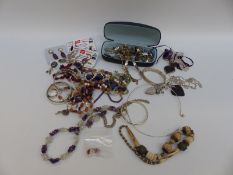 A collection of jewellery some silver, including bangles, bracelet set with amethysts, pendants,