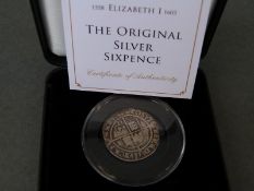 A cased Jubilee Mint 1569 Elizabeth I 6d,