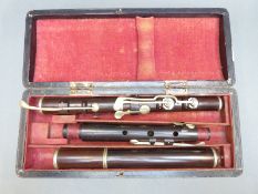 Beare & Son, London 19thC 'improved' rosewood flute with nickel keys,