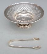 George V hallmarked silver pedestal bon bon dish with pierced basket style decoration,