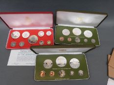 A cased Commonwealth of the Bahamas proof coin set together with two Trinidad and Tobago example