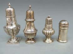 Four Victorian and later hallmarked peppers, tallest 10.