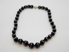 A glass beaded necklace