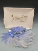 An early 20thC mother of pearl and ostrich feather fan by J Duvelleroy, London,