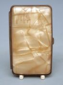 A faux mother of pearl box cigarette case