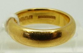 A 22ct gold ring/ wedding band, maker W.M and stamped Parsons, Birmingham 1932, size L, 10.