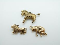 A 9ct gold charm/ pendant in the form of a monkey,