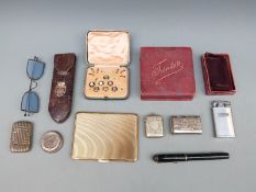A collection of bijouterie including silver plated vestas, glasses, studs, pen,