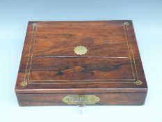 A 19thC inlaid rosewood writing slope with secret drawer and tooled leather interior,