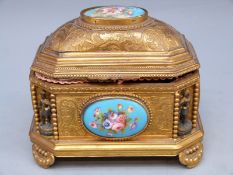 A 19thC French enamel and gilt casket with silk lined interior,