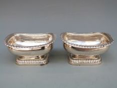 A pair of Georgian hallmarked silver open pedestal salts with gadroonded edge, London 1820,