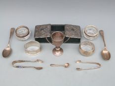 A quantity of hallmarked silver items including leather and embossed hallmarked silver double ended