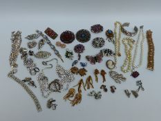 A collection of costume jewellery to include diamante necklace, Victorian paste jewellery,