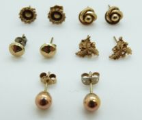 Five pairs of 9ct gold earrings including knots, faceted studs, flower studs etc, 4.
