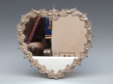 White metal or silver plated heart shaped dressing table mirror with crown to top, height 26cm,
