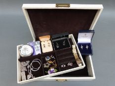 A collection of jewellery including a pair of white metal earrings set with a sapphire to each,