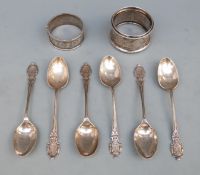 A set of six Walker & Hall hallmarked teaspoons and two silver napkin rings,