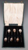 George V cased hallmarked silver set of six coffee bean spoons,