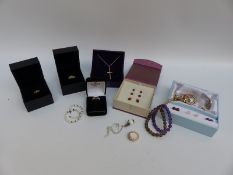 A collection of silver jewellery including 12 silver rings, silver necklaces,