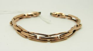 A 9ct rose gold watch strap, 5.