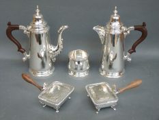 Two silver plated Georgian style coffee and hot water pots,