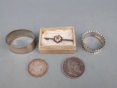 Two hallmarked silver napkin rings 36g, two early 20thC German coins,
