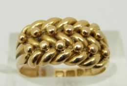 An 18ct gold keeper ring, Chester 1902, size N, 7.