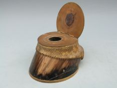 A Victorian taxidermy brass mounted horseshoe inkwell,