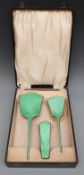 Art Deco green guilloché enamel three piece dressing table set,