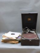 HMV portable wind-up gramophone together with a collection of shellac 78rpm records