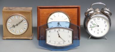 A collection of four mantel clocks including an Enfield, blue glass Deco style, Westclox,