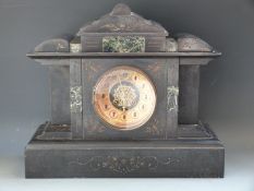 Victorian slate mantel clock with decorative green marble inlay,