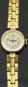 Tudor Royal gold plated ladies wristwatch, ref A2100, with black hands, gold Arabic numerals,