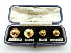 A set of 15ct gold studs in original box, 2.