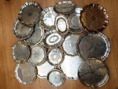 Eighteen various silver plated salvers and trays including a galleried example