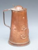 An Art Nouveau copper jug by JS and SB,