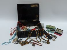 A collection of jewellery including Victorian brooches, beads, coral necklace,