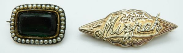 Victorian Mizpah brooch and a Victorian brooch set with a green foiled stone surrounded by seed