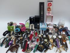 A large collection of various ladies and gentleman's wristwatches, some in original boxes.