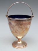 Georgian hallmarked silver pedestal sucrier with blue glass liner and swing handle,