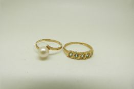 A 9ct gold ring set with a pearl and another 9ct gold ring set with blue topaz, size N, 1.4g, L, 1.