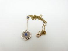 A 9ct gold necklace set with sapphires and diamonds in a platinum finished floral drop setting