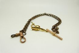 A 9ct gold T bar, 9ct gold clip (1g) and 9ct gold leopard pin (3.