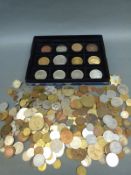 A quantity of mixed coins, tokens,