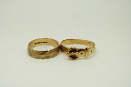A 9ct gold buckle ring and a 9ct gold wedding band/ ring, size J, 2.6g, O, 2.