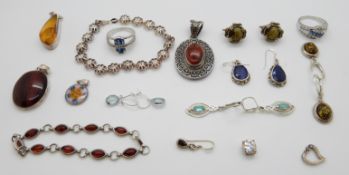Silver jewellery including a pendant set with millefiori glass, other pendants,