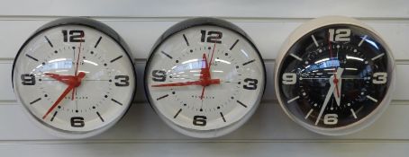 Three Newgate quartz 'bubble' clocks,
